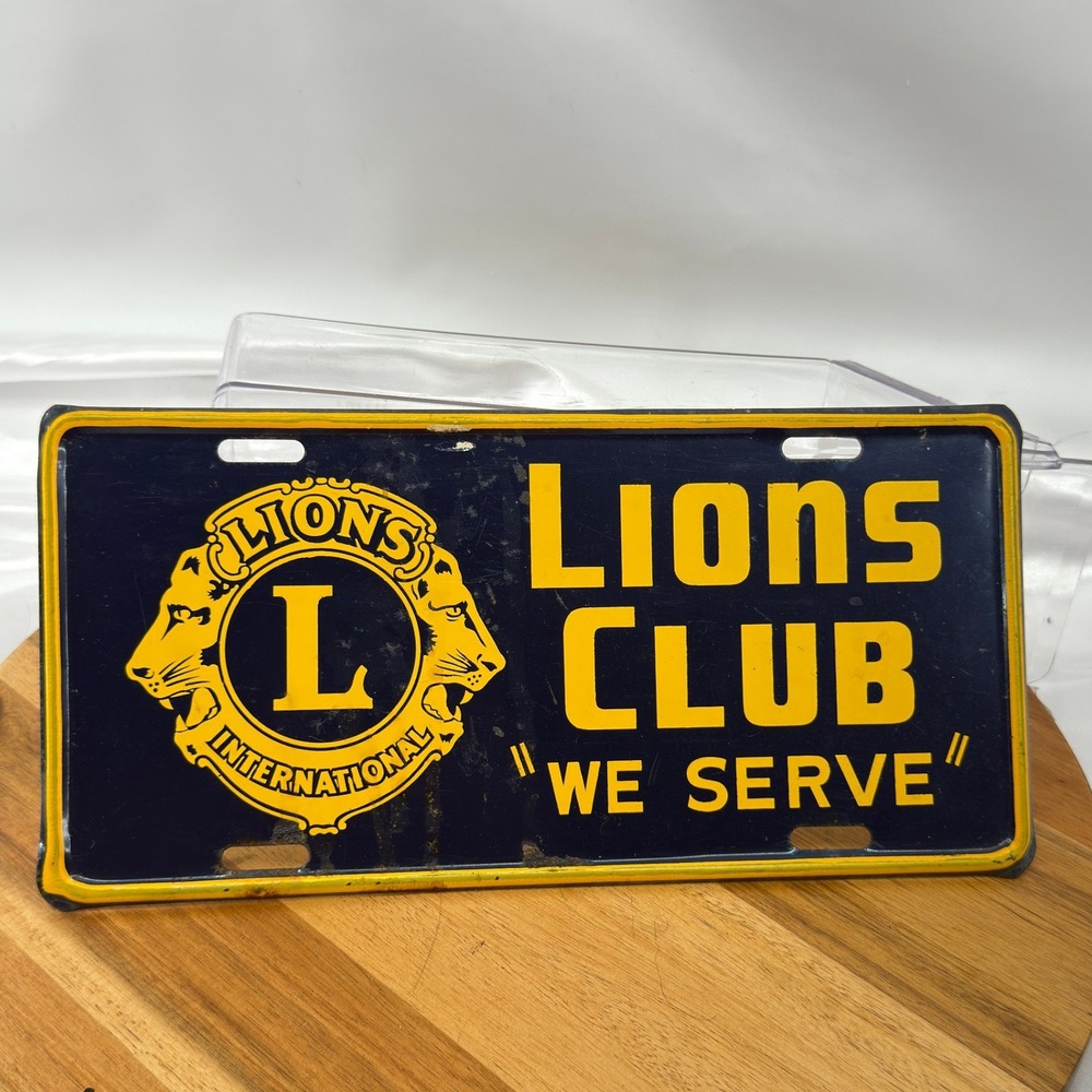 Lions Club International License Plate OS Blue Metal Vintage We Serve
